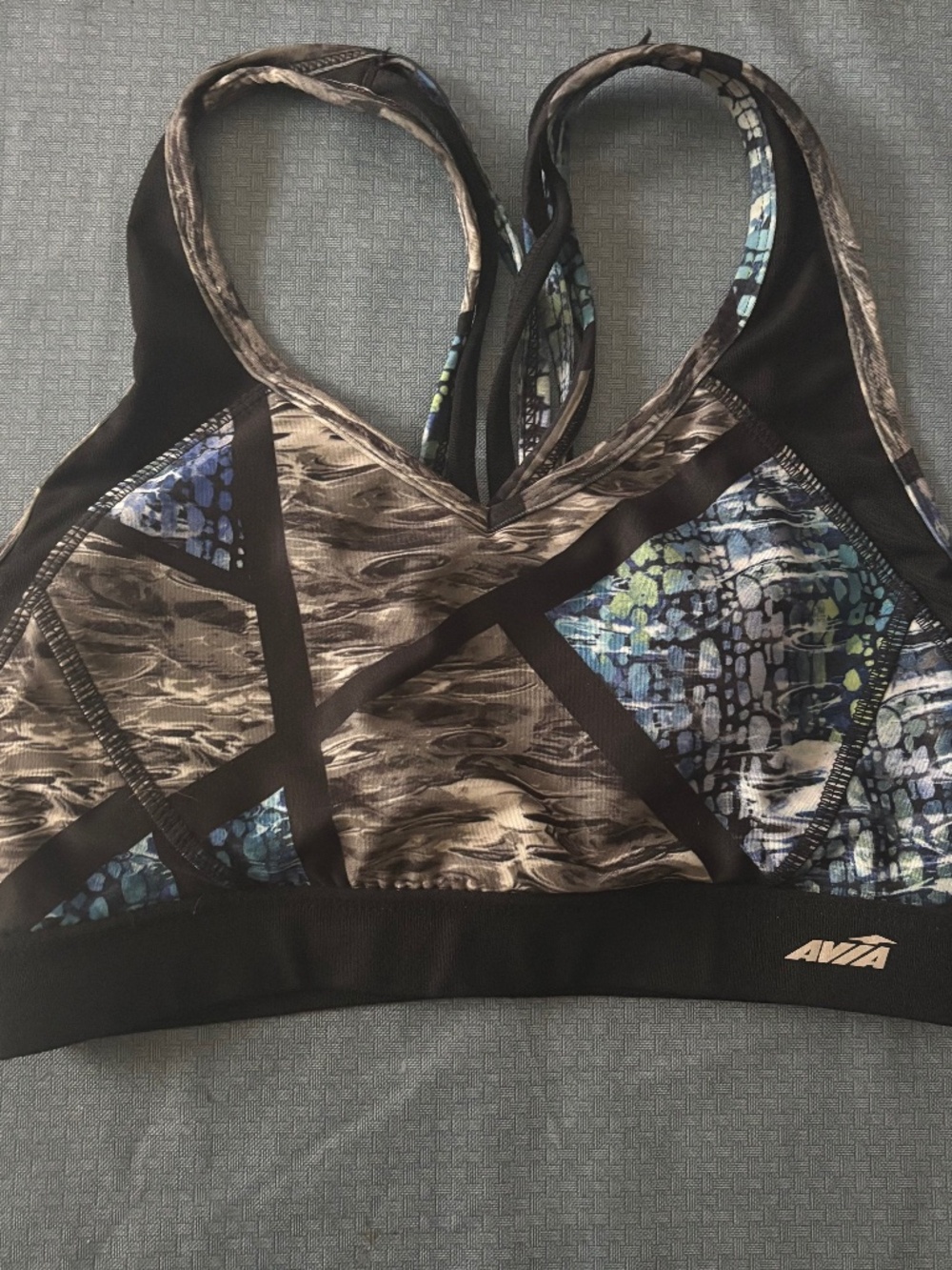 Black marble print color block sports bra, cross strappy back, wireless